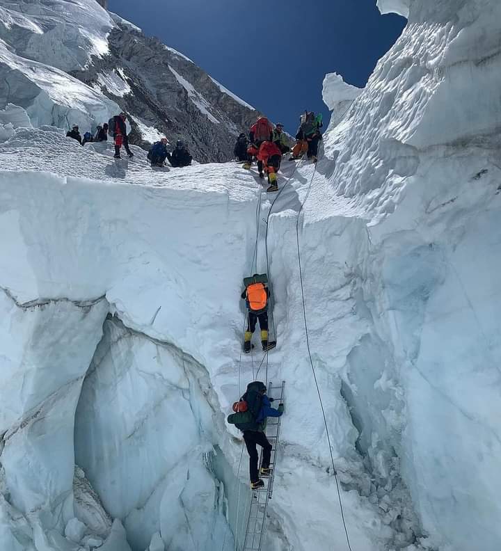 On Mount Everest, it is a race against time and everyone for him/herself.

